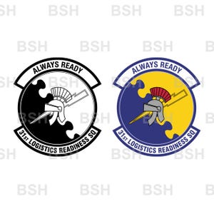 May include: Two circular emblems featuring a central helmet and lightning bolt design. The left emblem is black and white, while the right is blue, yellow, and red. Both include the text ALWAYS READY and 31st LOGISTICS READINESS SQ.