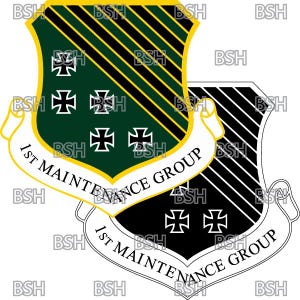 May include: A black and green shield with gold trim and white stripes. The shield has a white banner with the text "1st Maintenance Group" on it. The shield has a green background with four white crosses and a black background with two white crosses.