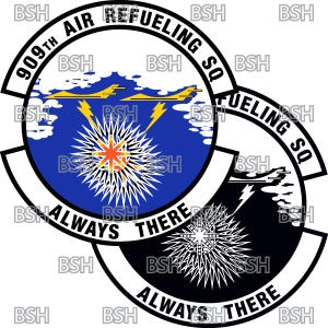 May include: A circular patch with the text "909th Air Refueling SQ" in a curved banner. The design includes a blue background with a white starburst and yellow lightning bolts. The words "ALWAYS THERE" are also visible.