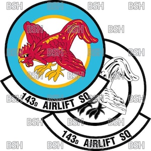 May include: A black and white emblem with a red rooster in the center. The emblem is circular and has the text "143d Airlift Sq" written around the outside.