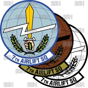May include: A blue and white globe with a yellow sword and lightning bolt, surrounded by green wheat stalks. The text "7th Airlift SQ" is written in a white arc around the globe.
