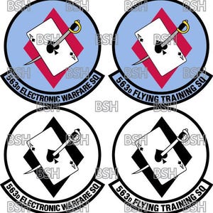 May include: Four round patches with black outlines. Two patches are light blue with a red diamond shape in the center. The other two patches are white with a black diamond shape in the center. Each diamond shape contains an ace of spades playing card with a sword through it. The text "563d ELECTRONIC WARFARE SQ" and "563d FLYING TRAINING SQ" are printed on the patches.