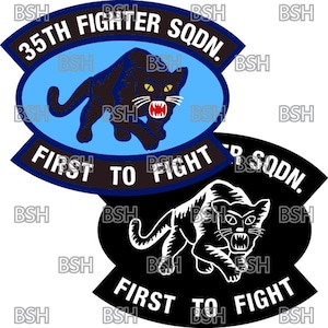 May include: Two black and white patches with a panther graphic. The top patch is blue and black with the text "35th Fighter SQDN. First to Fight". The bottom patch is black with the text "Fighter SQDN. First to Fight".