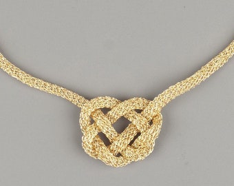 Bold gold celtic knot necklace . Free shipping