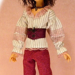 May include: A doll wearing a white and pink striped blouse with a purple corset, burgundy pants, and black shoes with buckles.