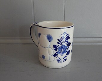 1984 D.A.I.C Handpainted Delft Blue Mug with Teddy Bear and Flowers Dutch American Import Company D A I C 1984 D.A.I.C Handpainted Delft Blue Mug with Teddy Bear and Flowers Dutch American Import Company D A I C
