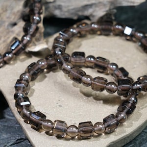 Bracciale con cubo di ossidiana di ghiaccio: gioiello in cristallo nero naturale per protezione, radicamento e forza