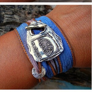 Sterling silver wrap bracelets handmade by artist HappyGoLicky Jewelry