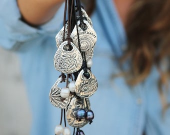Pärlsmycken, Pärlhalsband, Naturligt pärlhalsband, Pärlsmycken i läder, Läder- och pärlsmycken, Silverpärlhalsband i läder