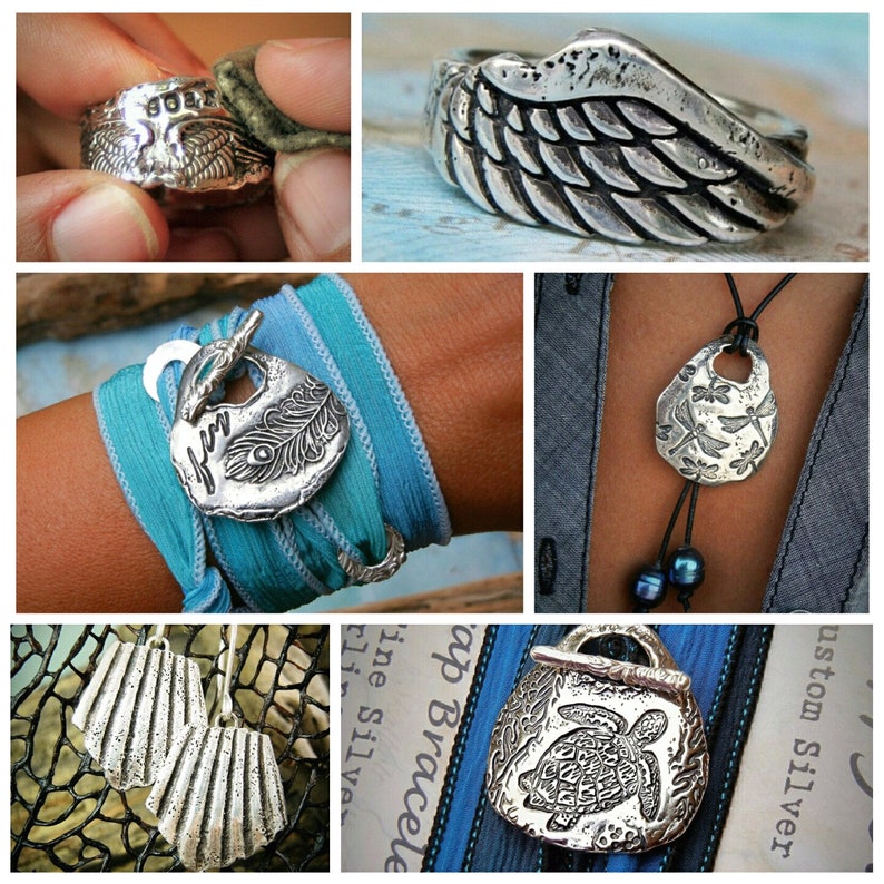 May include: A collection of handmade silver jewelry featuring various designs, including wings, a dragonfly, a turtle, and a peacock feather. The jewelry is displayed on a variety of surfaces, including wood, fabric, and metal.