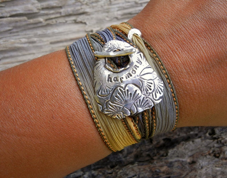 Sterling silver wrap bracelets handmade by artist HappyGoLicky Jewelry