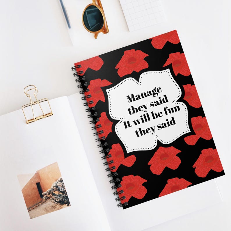 Floral spiral-bound notebook with professional yet playful vibe, great for HR staff or team retreats.
