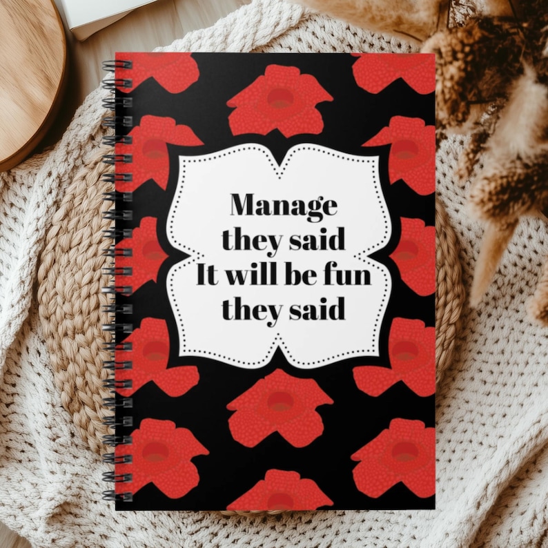 Spiral notebook with floral cover and “Manage they said” quote, great gift for new managers or team leaders.