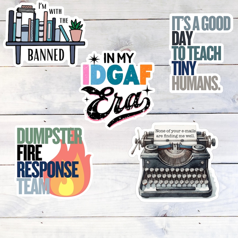May include: Five colorful stickers on a woodgrain background. The stickers are: 'I'm with the banned', 'In my IDGAF Era', 'It's a good day to teach tiny humans', 'Dumpster fire response team', and 'None of your e-mails are finding me well' with a vintage typewriter illustration.

Dumpster Fire Vinyl Sticker, Funny office gift for coworker, Dumpster Fire Response Team, vinyl waterproof sticker, office gag gift for boss