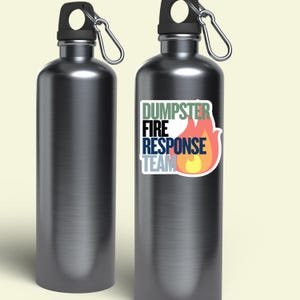 May include: Two silver water bottles with a sticker on one of the bottles. The sticker is white with black, green, blue, orange, and yellow text that reads 'DUMPSTER FIRE RESPONSE TEAM' and a red and orange flame graphic.

Dumpster Fire Vinyl Sticker, Funny office gift for coworker, Dumpster Fire Response Team, vinyl waterproof sticker, office gag gift for boss