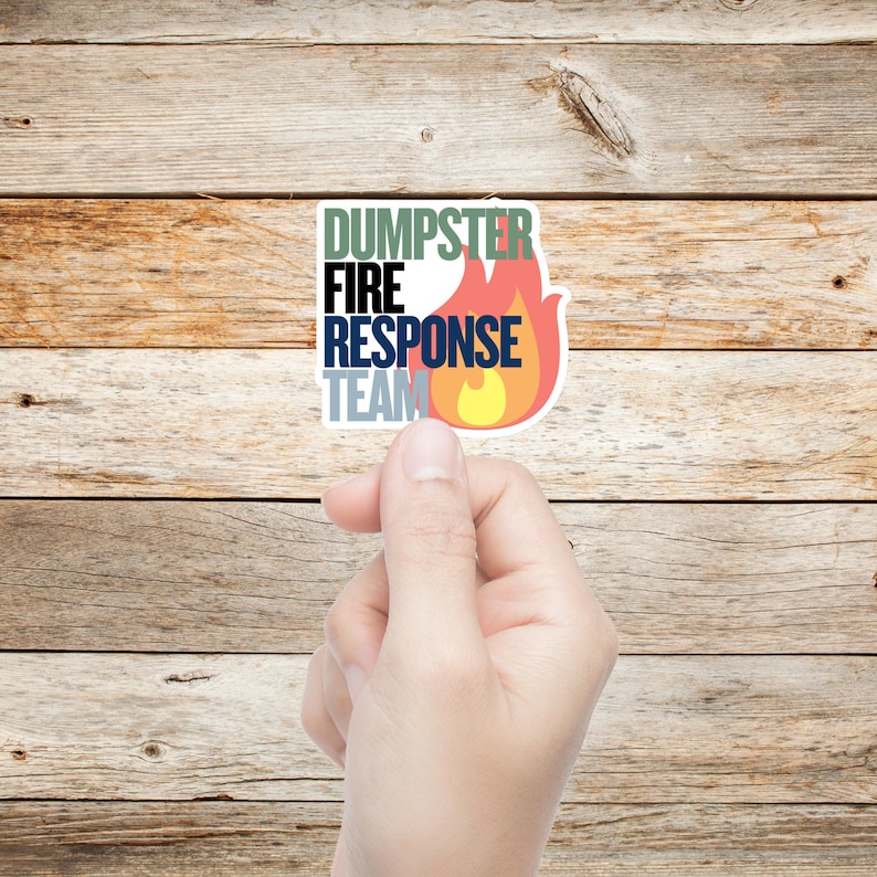 May include: A white sticker with the words 'DUMPSER FIRE RESPONSE TEAM' in different colors. The word 'FIRE' is in black, 'DUMPSER' is in green, 'RESPONSE' is in blue, and 'TEAM' is in gray. A red and yellow flame graphic is next to the words.

Dumpster Fire Vinyl Sticker, Funny office gift for coworker, Dumpster Fire Response Team, vinyl waterproof sticker, office gag gift for boss