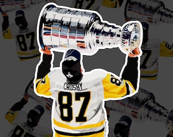 May include: A sticker featuring a hockey player in a white and yellow jersey, number 87, holding the Stanley Cup trophy overhead. The player's name, Crosby, is visible. The background shows repeating images of the same player.