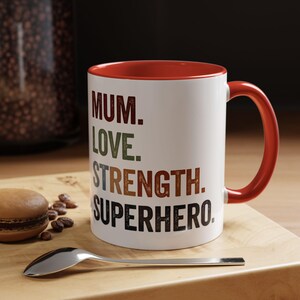 Mum, Love, Strength, Superhero Accent Coffee Mug with coloured handles and inside. Perfect Gift For Your Mum, Mother&#39;s Day Gift.