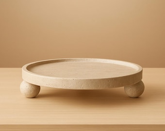 Bandeja redonda de travertino: centro de mesa moderno y minimalista para la decoración del hogar.