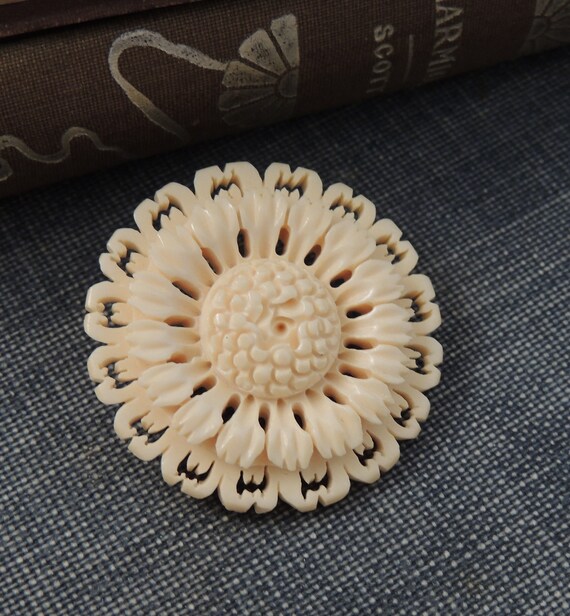 vintage carved bone brooch Gem