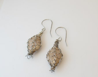 Captive Pink Opal in fine silver woven chain on a sterling french hook earwire