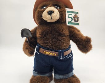 Peluche vintage Smokey Bear 50° anniversario 1994 IBIT Denim Jeans Shovel Nuovo con etichette