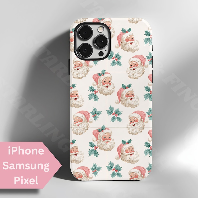 May include: A phone case with a repeating pattern of Santa Claus faces and holly sprigs on a white background. The Santa faces have pink hats and white beards. The text "iPhone Samsung Pixel" is in a pink arrow-shaped box.