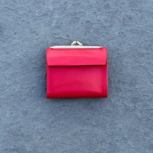 Monedero vintage Lady Buxton de piel de vaca roja con dos pliegues para mujer