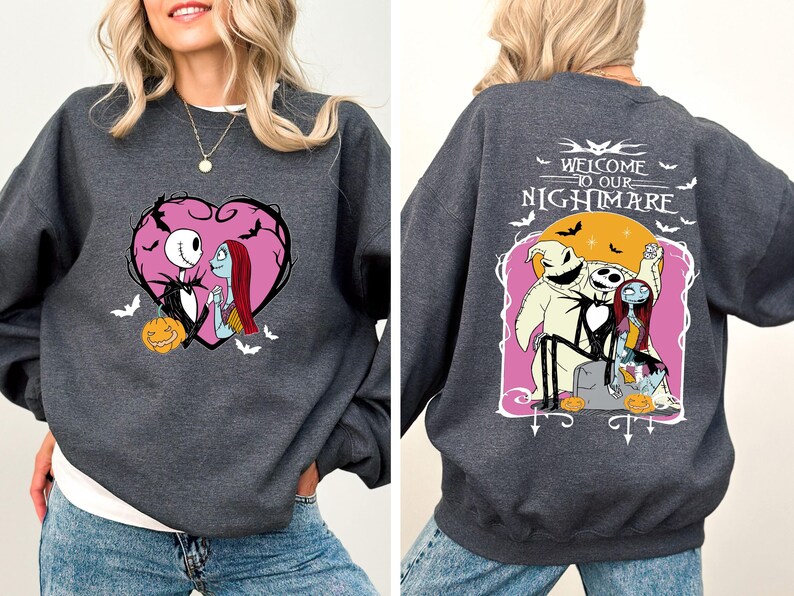 May include: Dark gray sweatshirt featuring a heart-shaped graphic with Jack Skellington and Sally. The back of the sweatshirt has the text "WELCOME TO OUR NIGHTMARE" with characters from the movie. A Halloween-themed apparel item.