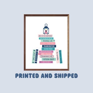 May include: A printable wall art design featuring a stack of books with titles like "Alice in Wonderland", "The Catcher in the Rye", "Pride & Prejudice", and "Frankenstein". The books are arranged in a stack with a lantern on top. The text "PRINTED AND SHIPPED" is at the bottom of the design.