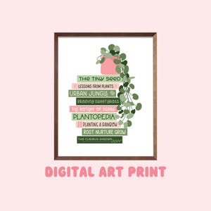 May include: A framed digital art print featuring a pink pot with a trailing plant. The print includes text such as "Urban Jungle" and "Plantopedia" in various colors. The words "Digital Art Print" are at the bottom.