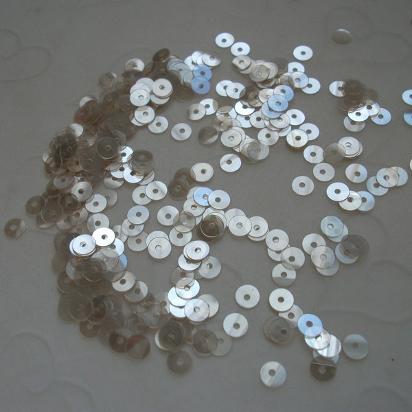 7 g of 4 mm Flat Round Sequins in Satin Light Flax Seed Color