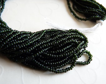 One hank of Czech Transparent Dark Olive Green seed beads - 0423 size 11