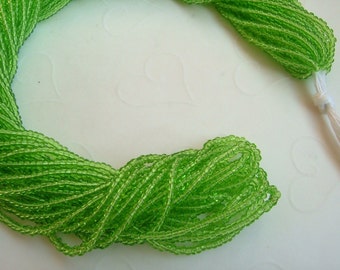 One hank of Czech Transparent Light Pale Green  seed beads - 0421 size 11