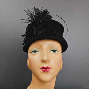 Vintage Black Hat with Felt Bow and Feather Puff, 1950s Toque, 21 inch head