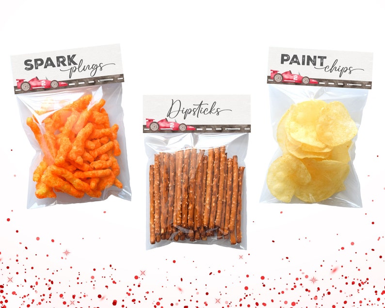 May include: Three clear plastic bags with labels and snacks. The labels are red, white, and black with a cartoon race car. The labels read "Spark Plugs", "Dipsticks", and "Paint Chips". The bags contain orange cheese puffs, pretzel sticks, and potato chips.