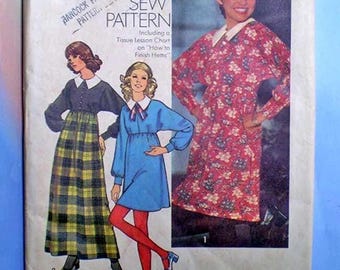 May include: A sewing pattern envelope featuring illustrations of two dresses and a photograph of a third dress. The text reads HOW TO SEW PATTERN Including a Tissue Lesson Chart on How to Finish Hems. The garments include a long plaid skirt, a short blue dress, and a long-sleeved floral dress.