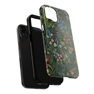 Glossy phone case with a dense botanical illustration of clovers and wildflowers on a dark green background, giving it a woodland cottagecore feel