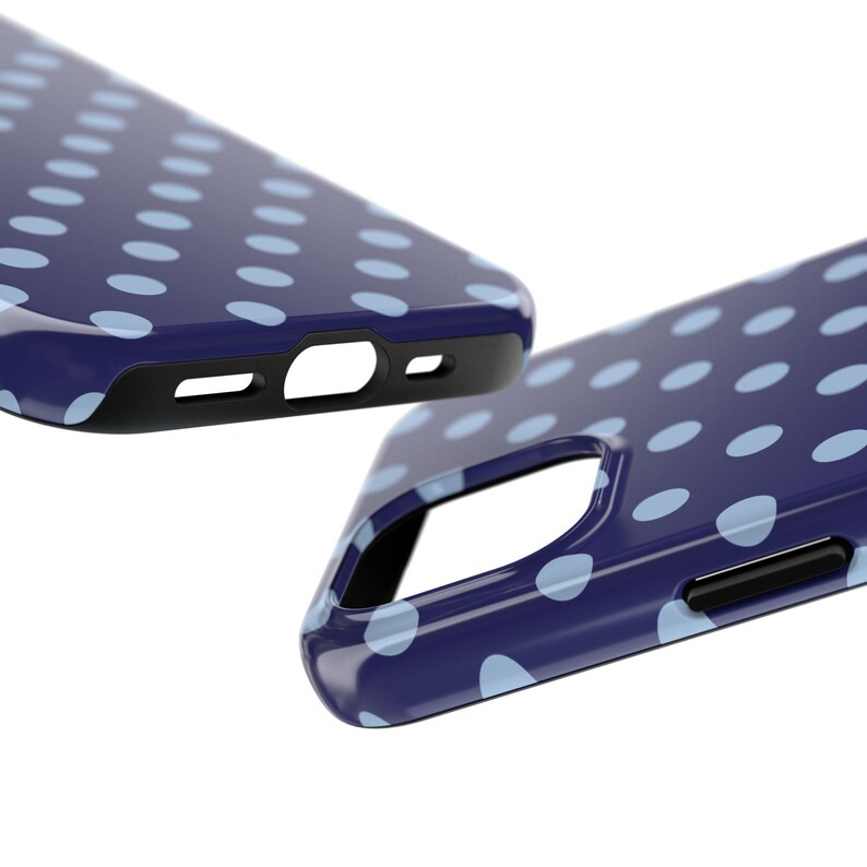 Phone case with light blue polka dots on a navy background in a minimalist preppy design