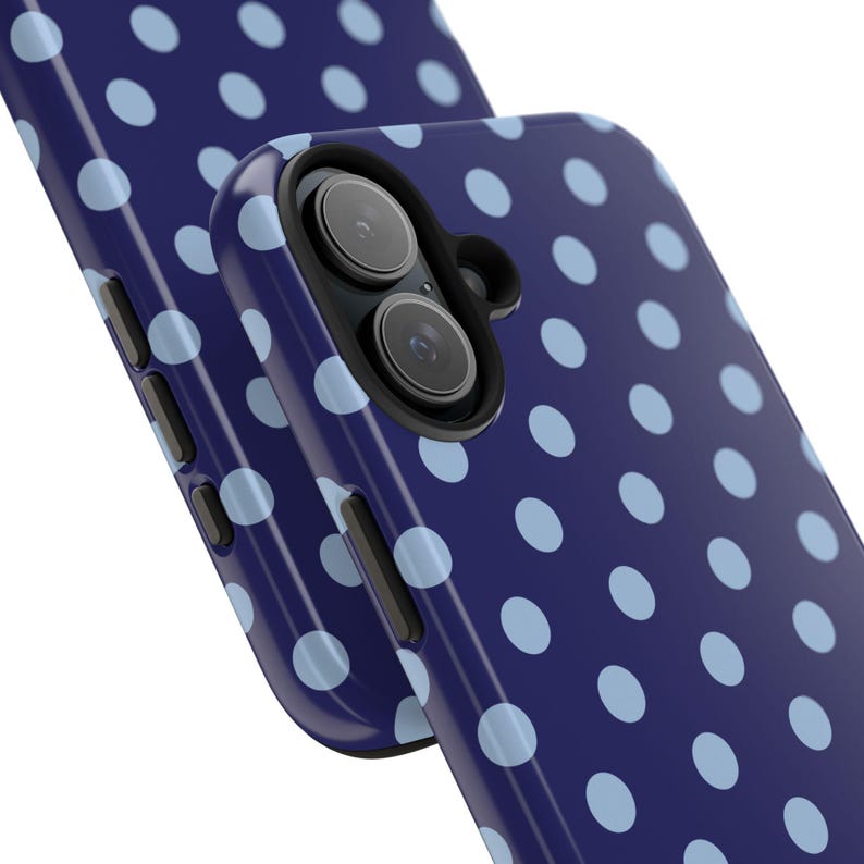 Phone case with light blue polka dots on a navy background in a minimalist preppy design