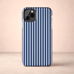 May include: A smartphone case with a vertical striped pattern in navy blue and white. The case has a glossy finish and a camera cutout on the upper left corner.