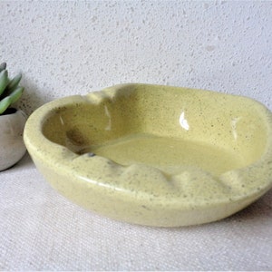 vintage yellow pottery ashtray mid century style