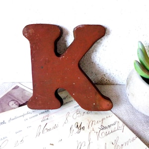 Vintage solid brass paperweight,  metal letter K