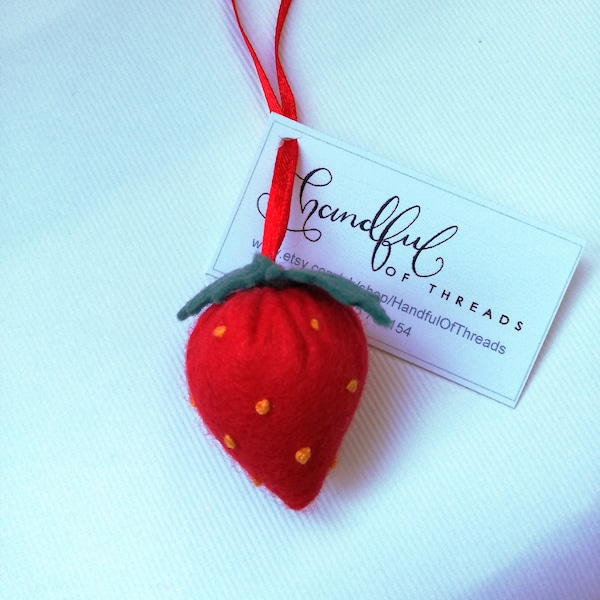 Felt Strawberry Decoration pin cushion with embroidery detail.