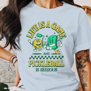 Life Is A Game And Pickleball Is Serious T-Shirt, Funny Pickleball Shirt, Pickleball Lovers Gift, Pickleball Enthusiast Tee
