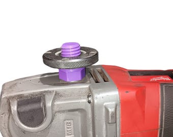 Nut holder for 4 inch grinder