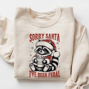 Bluza z kapturem Christmas Raccoon, Przepraszam Mikołaju, byłem dzikim kapturem, Śmieszny sweter Raccoon, Odzież z memami świątecznymi, Śmieszny świąteczny sweter z okrągłym dekoltem