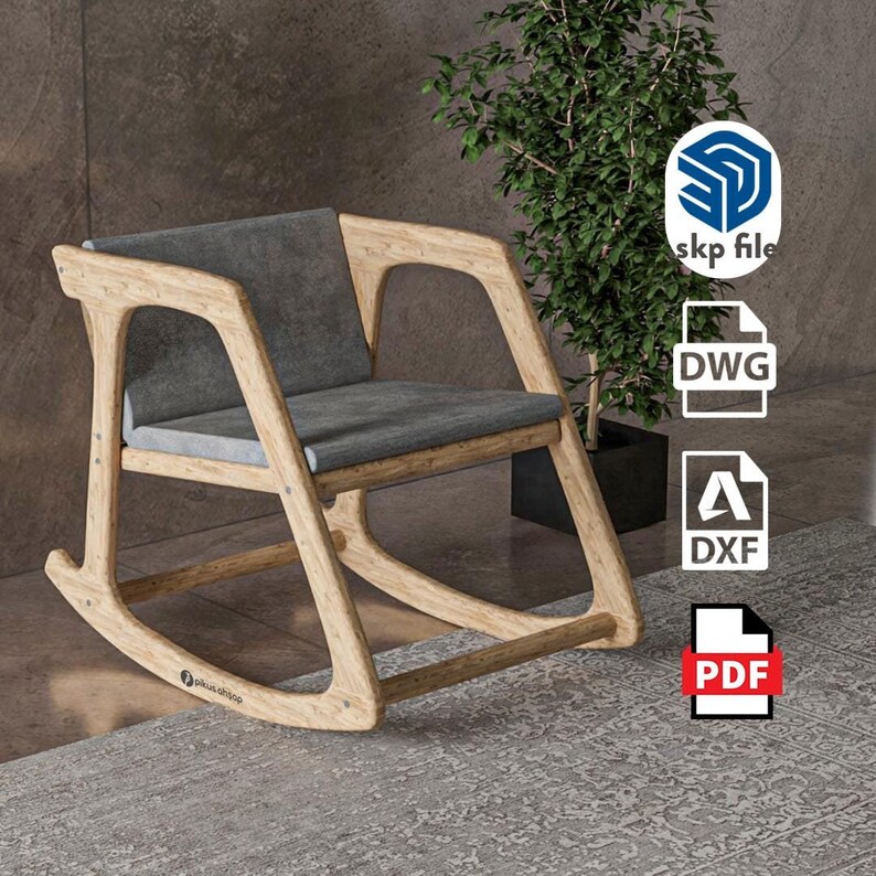 Peut inclure: Un fauteuil &agrave; bascule en bois clair avec une assise et un dossier rembourr&eacute;s gris. La structure pr&eacute;sente des patins incurv&eacute;s et des accoudoirs int&eacute;gr&eacute;s. Des ic&ocirc;nes de fichiers skp, DWG, DXF et PDF ainsi que le texte pikus.shop sont visibles.