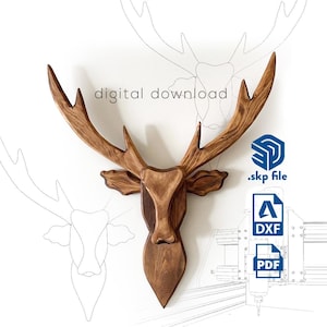 Könnte beinhalten: Ein Wandhalter aus Holz in Form eines Hirschkopfes mit brauner Beize. Der Hirschkopf ist ein digitaler Download, der in den Formaten .skp, .dxf und .pdf verfügbar ist. "digitaler Download" ist in weißer Schrift auf weißem Hintergrund geschrieben.