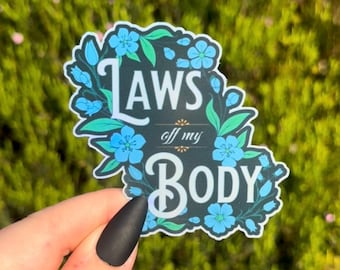 Pegatina holográfica de izquierdas y feminista a favor del derecho a decidir: "Leyes fuera de mi cuerpo" Diseño floral